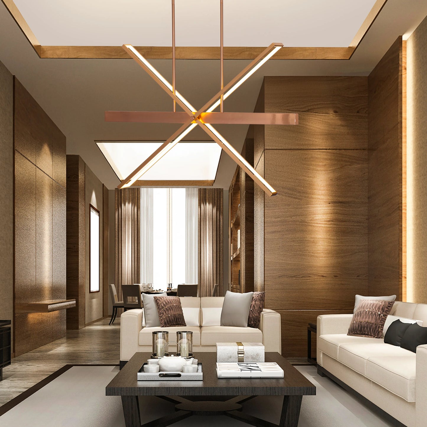 Large gold Pack Your Bags chandelier with dimmable LED lights illuminating a grand foyer