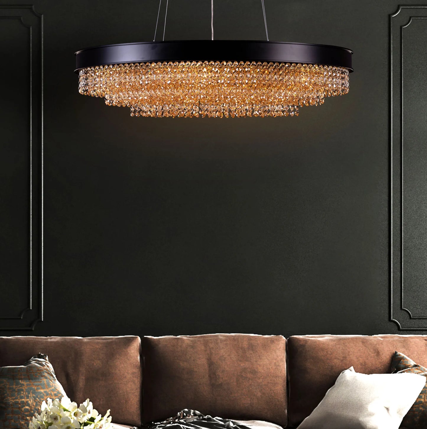 Black Tie large oval crystal chandelier illuminating an elegant dining room