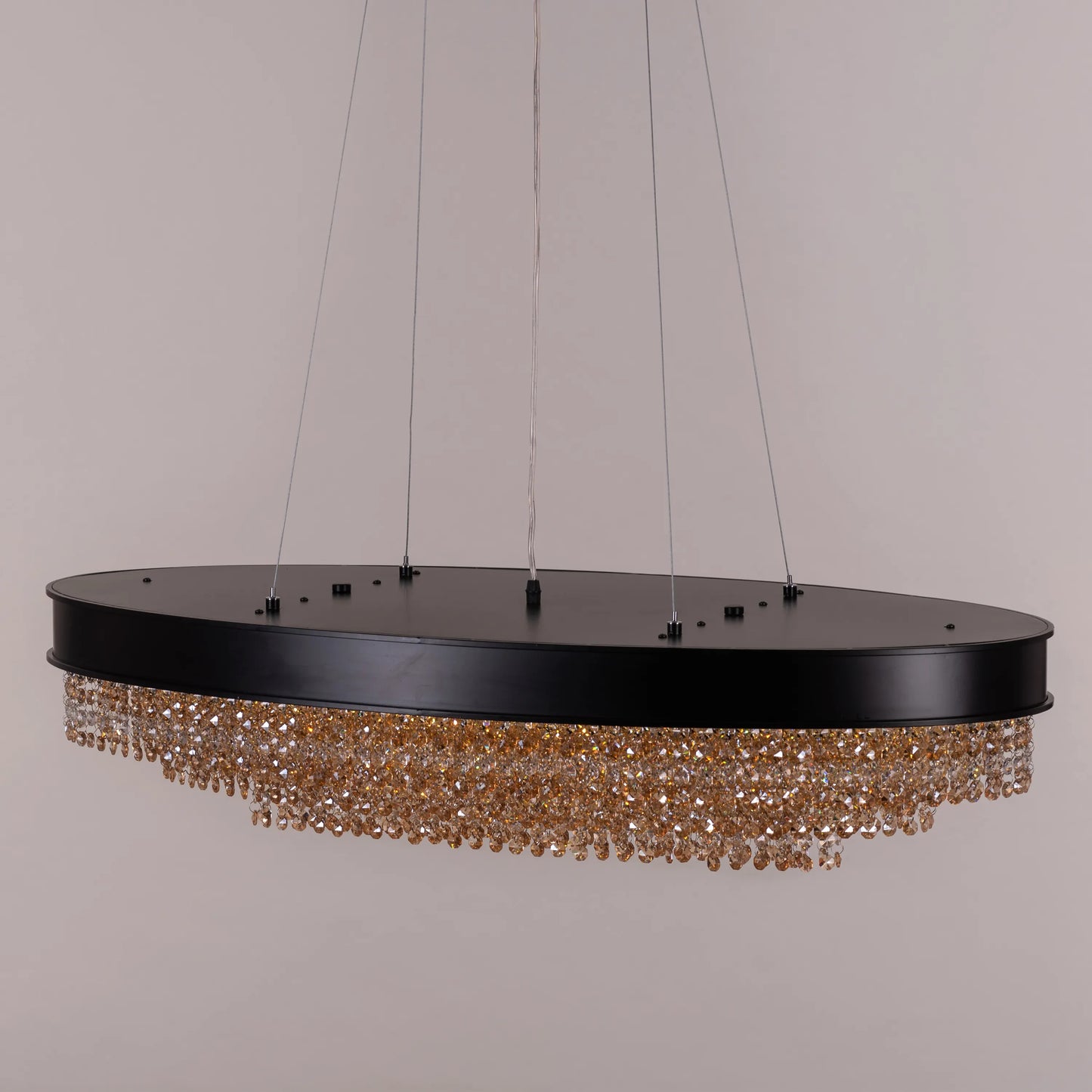 Close-up of Black Tie chandelier's intricate black frame and crystal details
