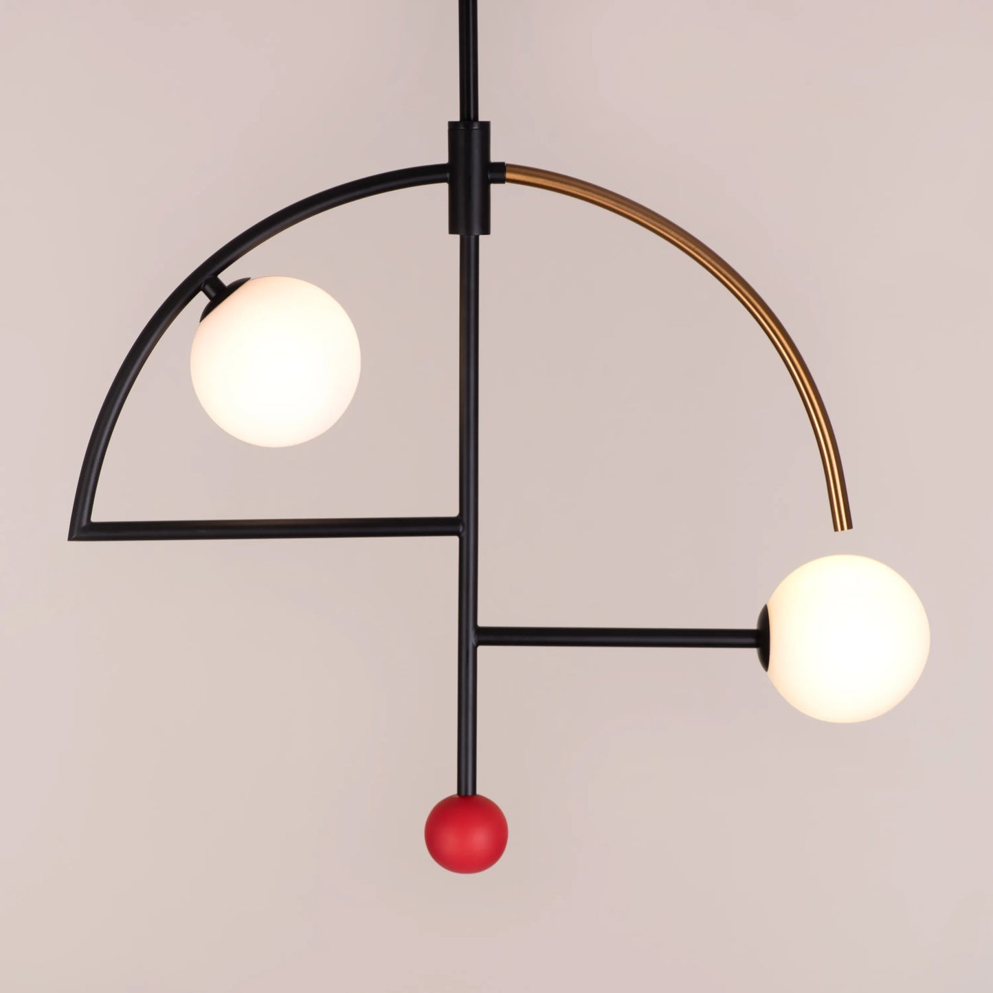 A stylish pendant light named 'Keep On Dancing' featuring a sleek black and gold design. The fixture showcases a dynamic, flowing shape, with a matte black exterior contrasted by a radiant gold interior that reflects warm light. Its modern and elegant look adds a sense of movement and sophistication to any room.