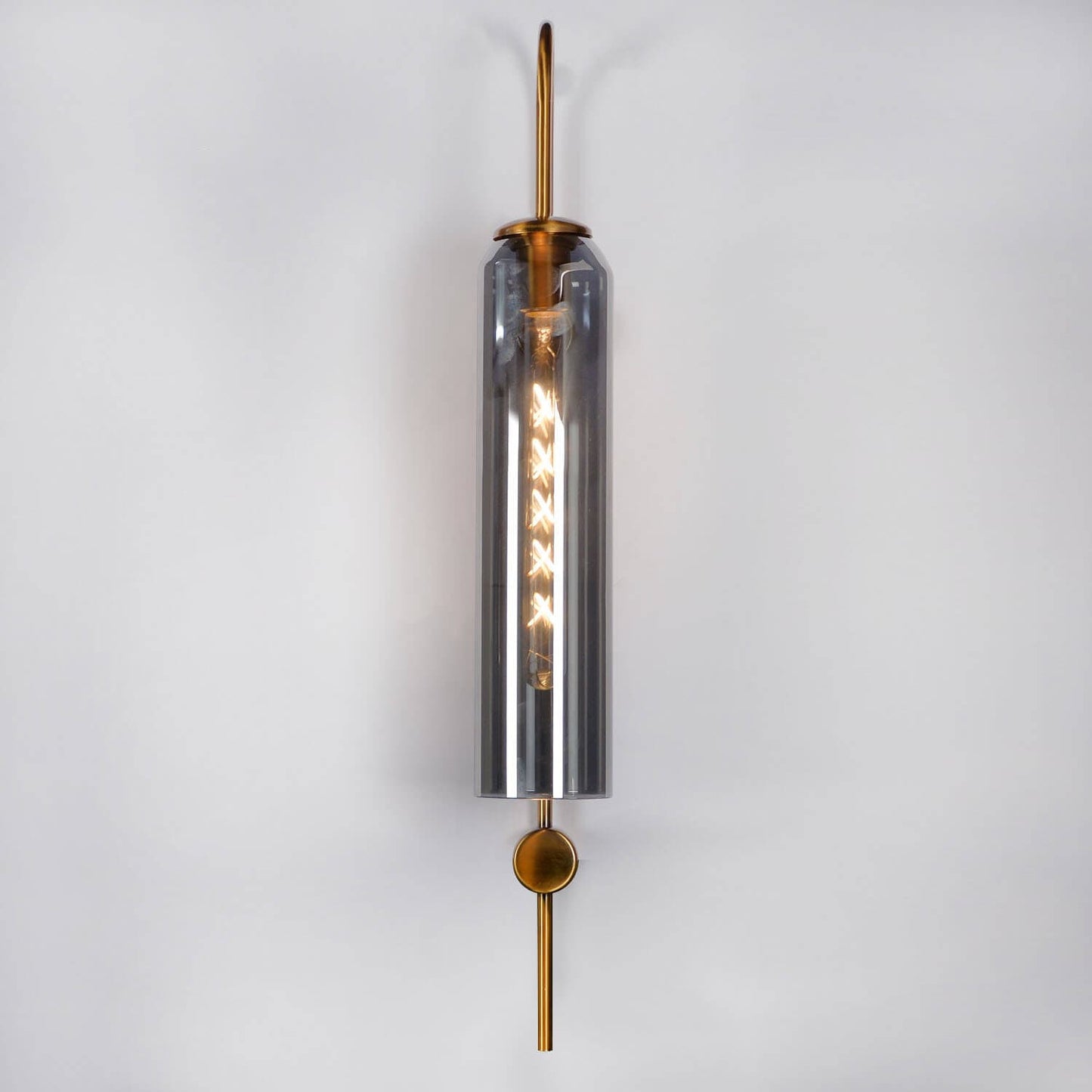 Guiding wall light, ancestral roots illuminated, whispers of wisdom.