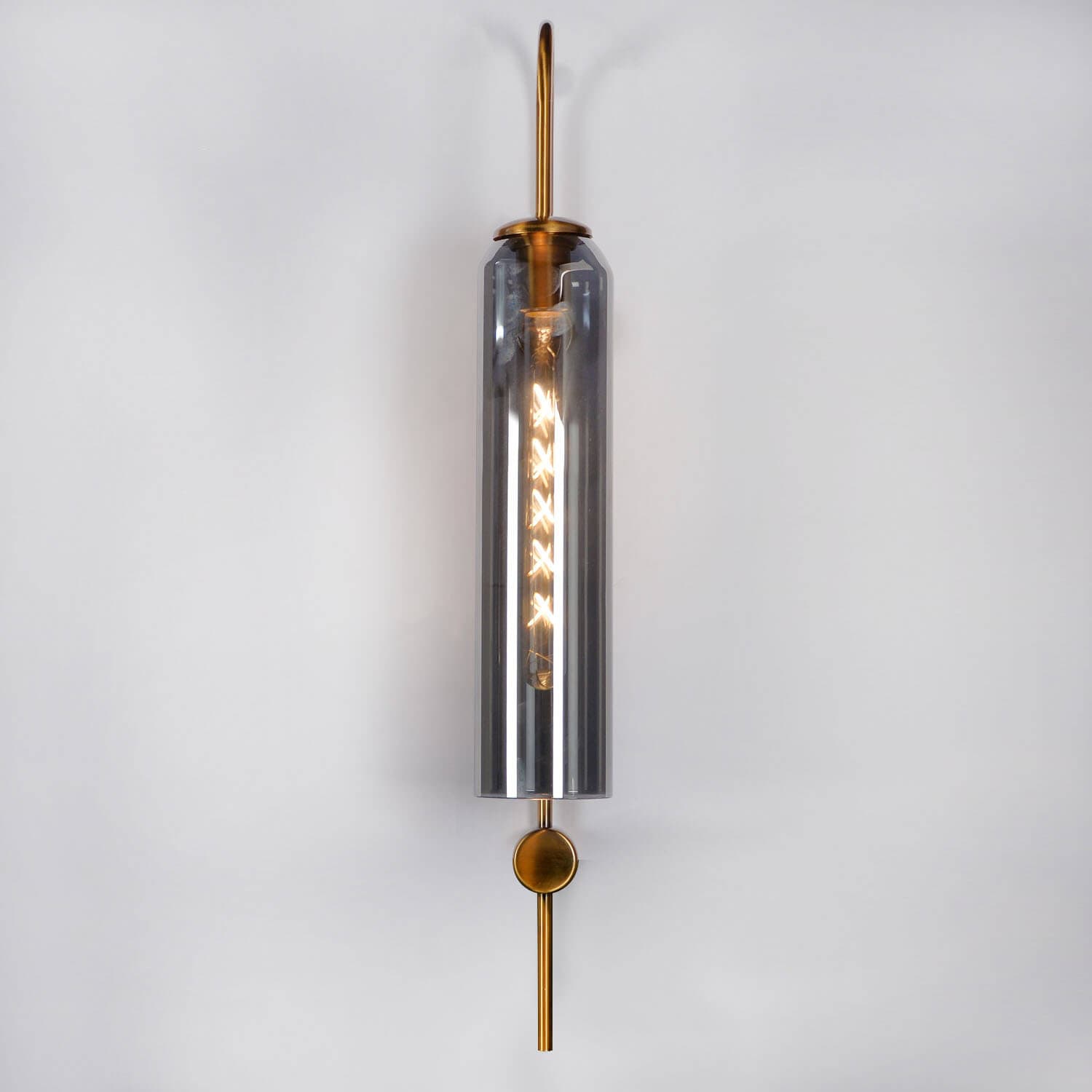 Guiding wall light, ancestral roots illuminated, whispers of wisdom.