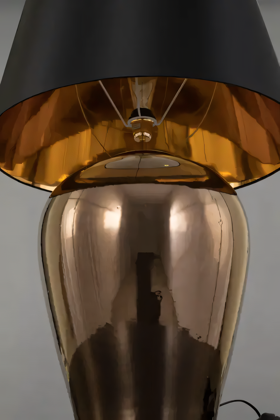 Oversized ceramic table lamp with black and gold umbrella shade