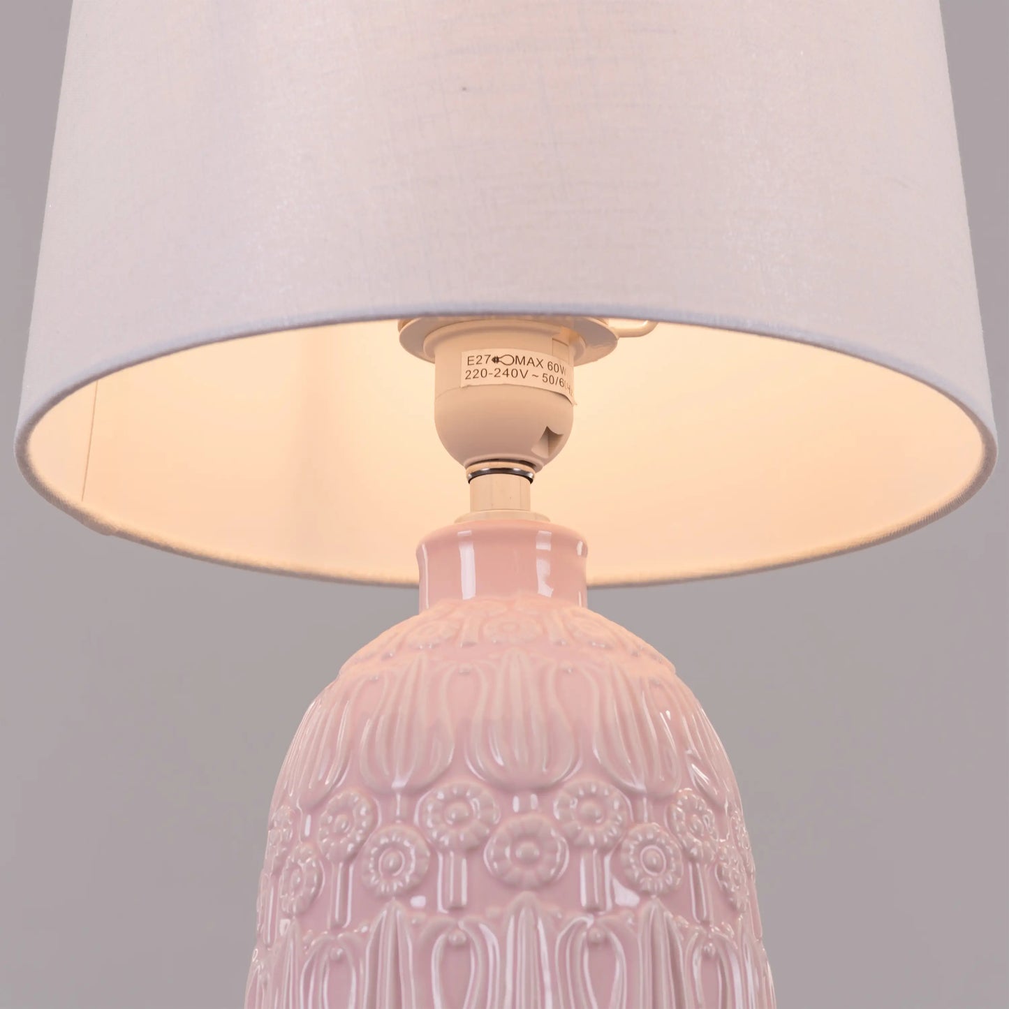 Ceramic table lamp exuding femininity and whimsy