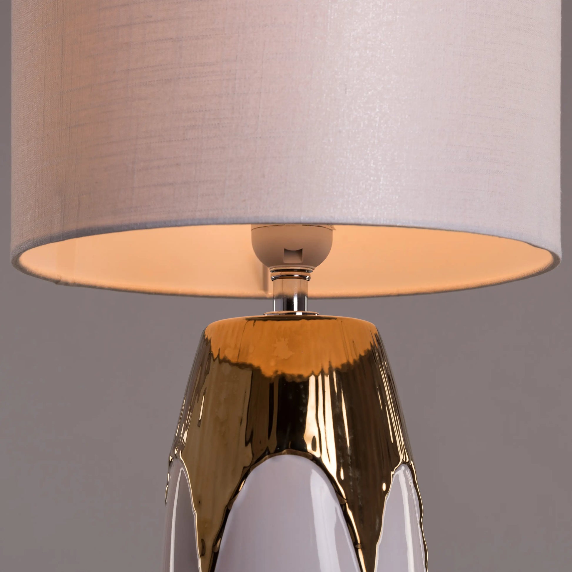 Warm, ambient lighting from a regal table lamp