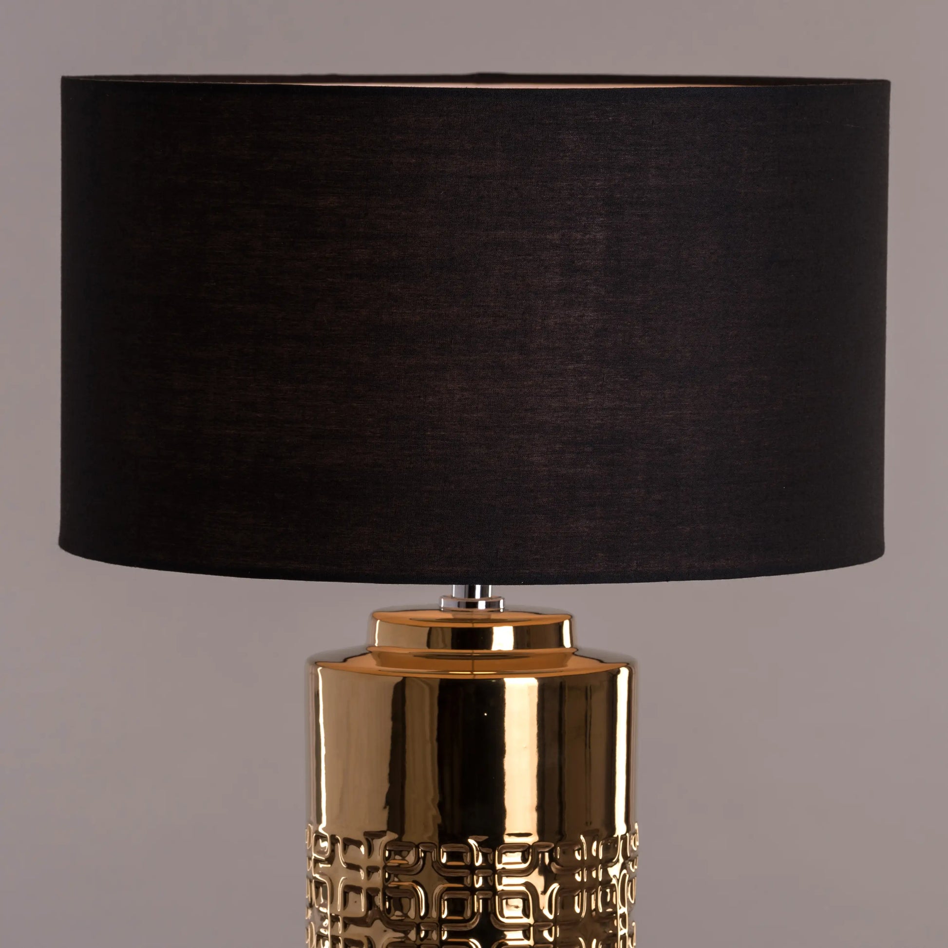 Warm, inviting glow from a smokey table lamp