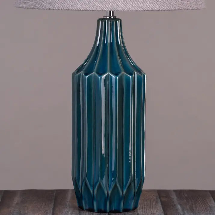 Tranquil ambiance from blue ceramic table lamp