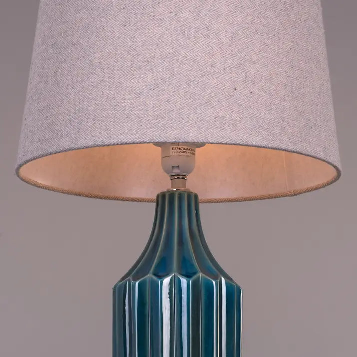 Handcrafted blue ceramic lamp for coastal interiors