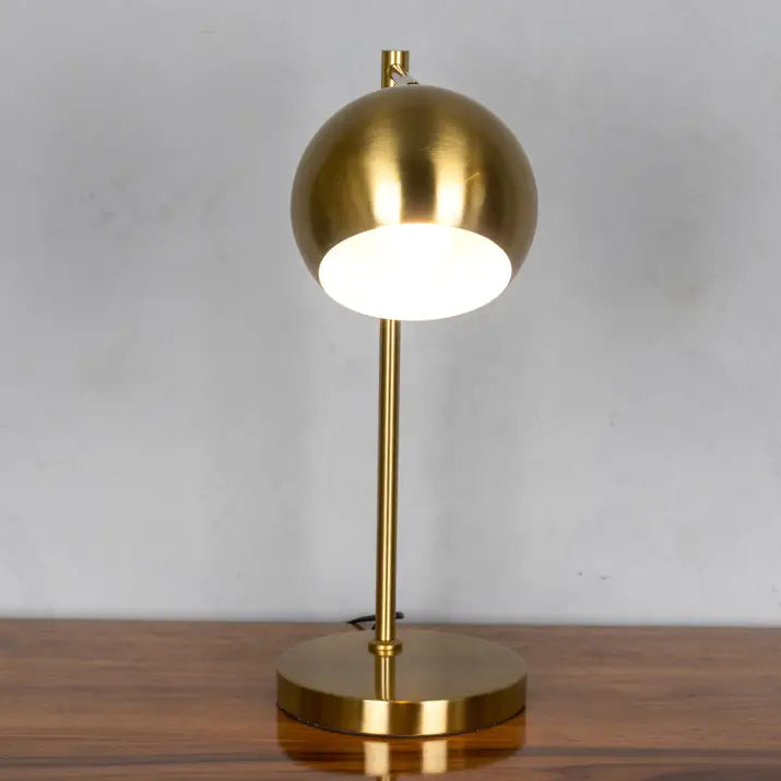 Refined opulence in gold study lamp design