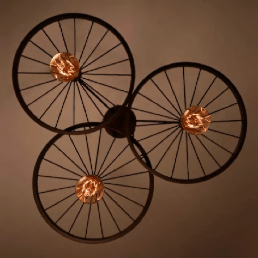 Captivating wheel-shaped hanging light fixture with a touch of industrial charm