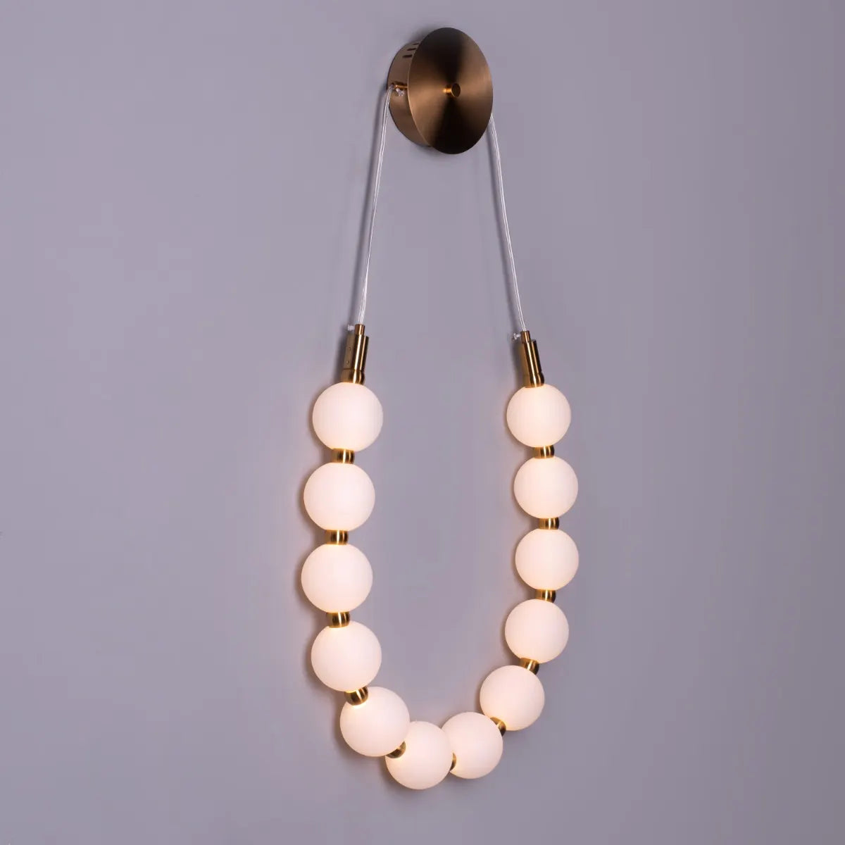 Be The Story Wall Light – statement wall light with artistic design and soft ambient glow, ideal for modern luxury interiors.