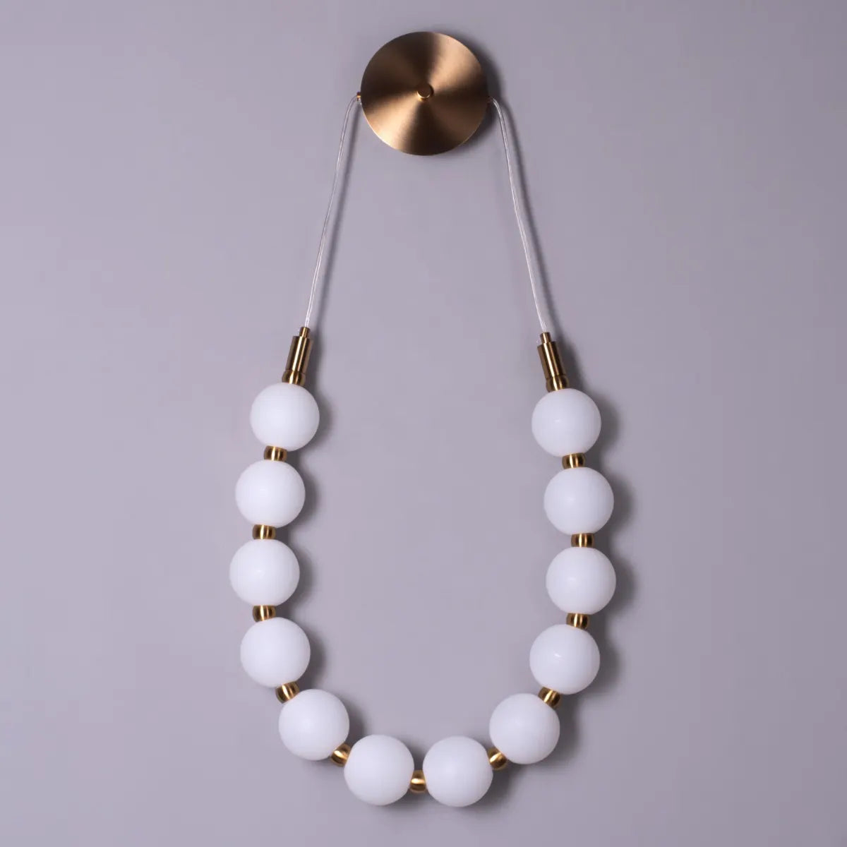 Be The Story Wall Light – statement wall light with artistic design and soft ambient glow, ideal for modern luxury interiors.