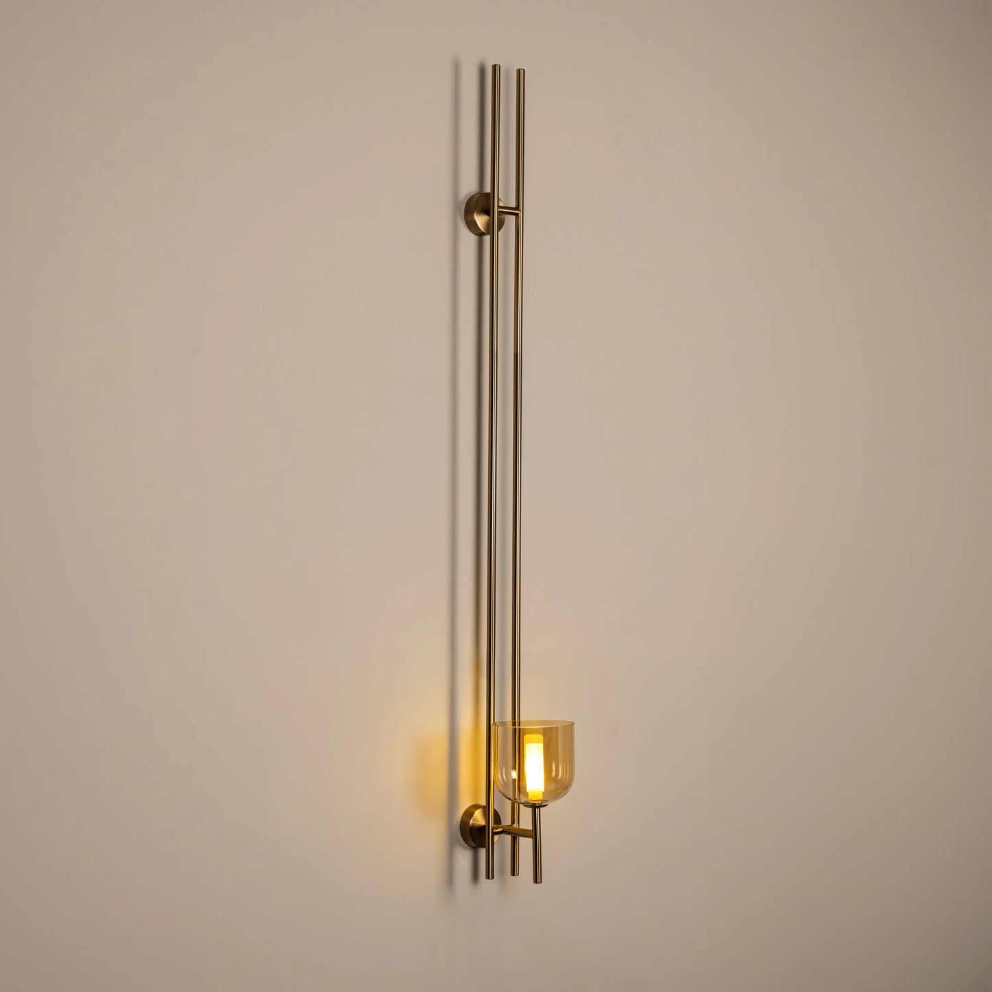 Moments Matter Wall Light in Gold and Amber with Clear Glass – luxury wall light featuring a golden frame, amber accents, and clear glass for an elegant and radiant glow, perfect for sophisticated interiors.