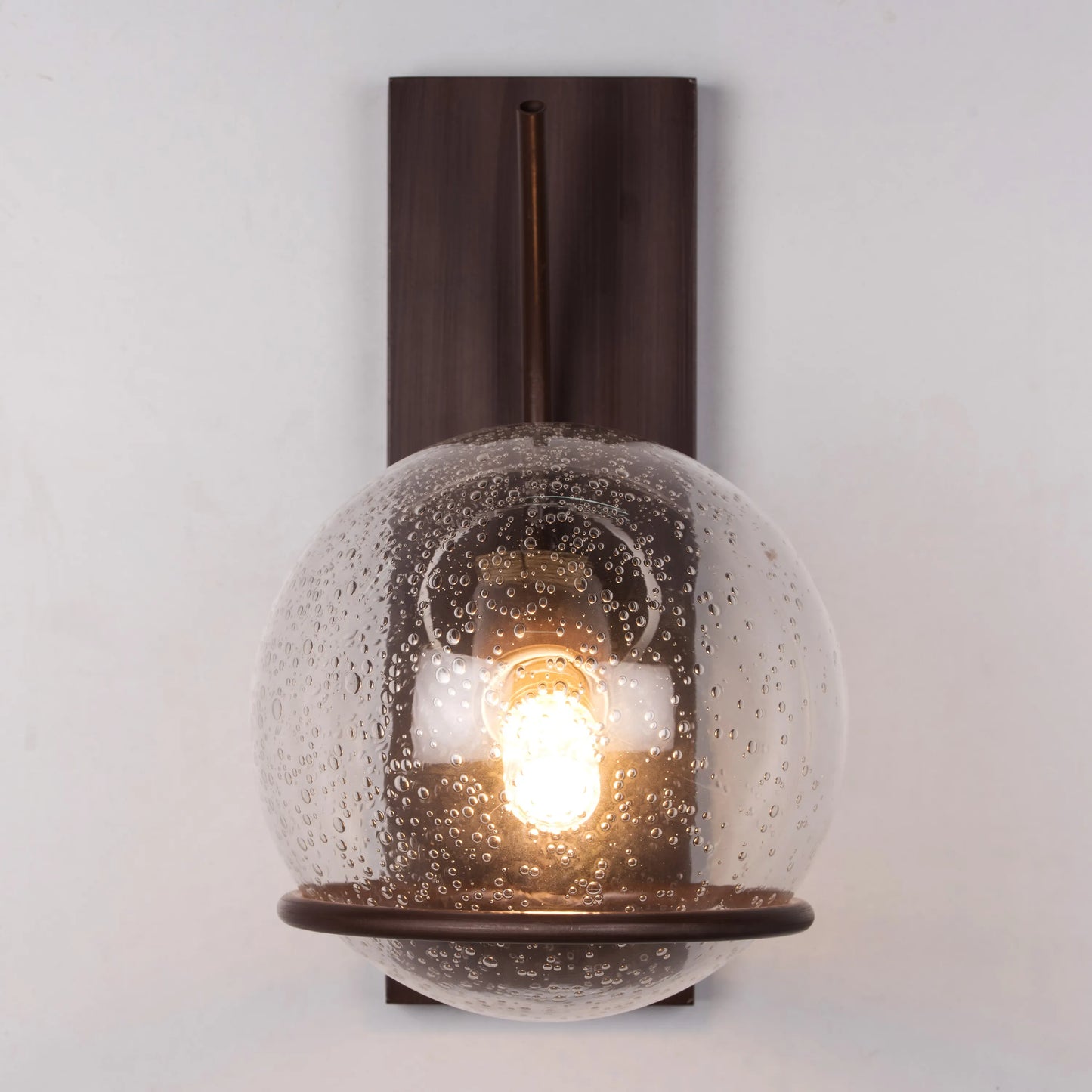 Bashful Bubbled Glass Wall Light – elegant wall light with unique bubbled glass design, offering warm, ambient lighting for modern interiors.
