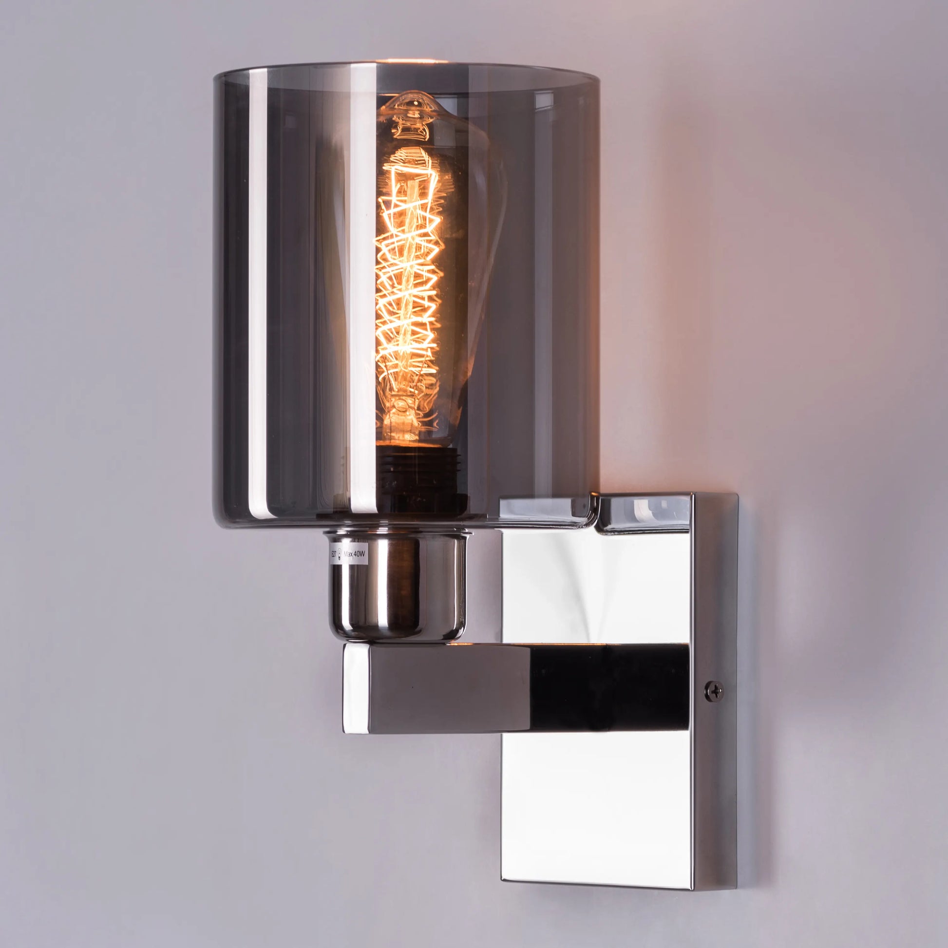 Simpleton Stainless Steel Wall Light – modern, minimalist wall light made from durable stainless steel, offering soft, ambient illumination for contemporary spaces.