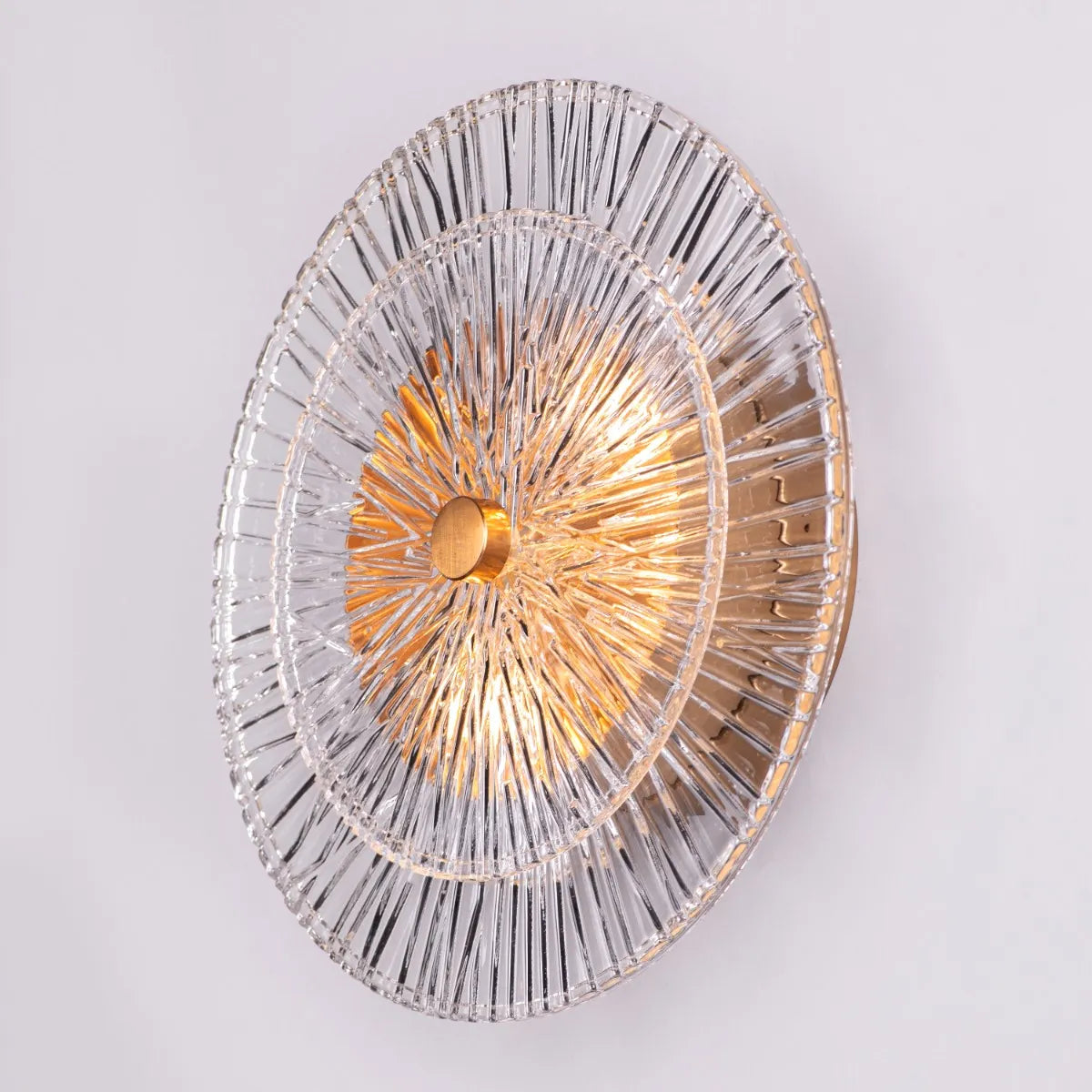 "Feel My Crown" Textured Glass Wall Light - A sleek, modern wall sconce with a textured glass shade that diffuses a warm, glowing light.