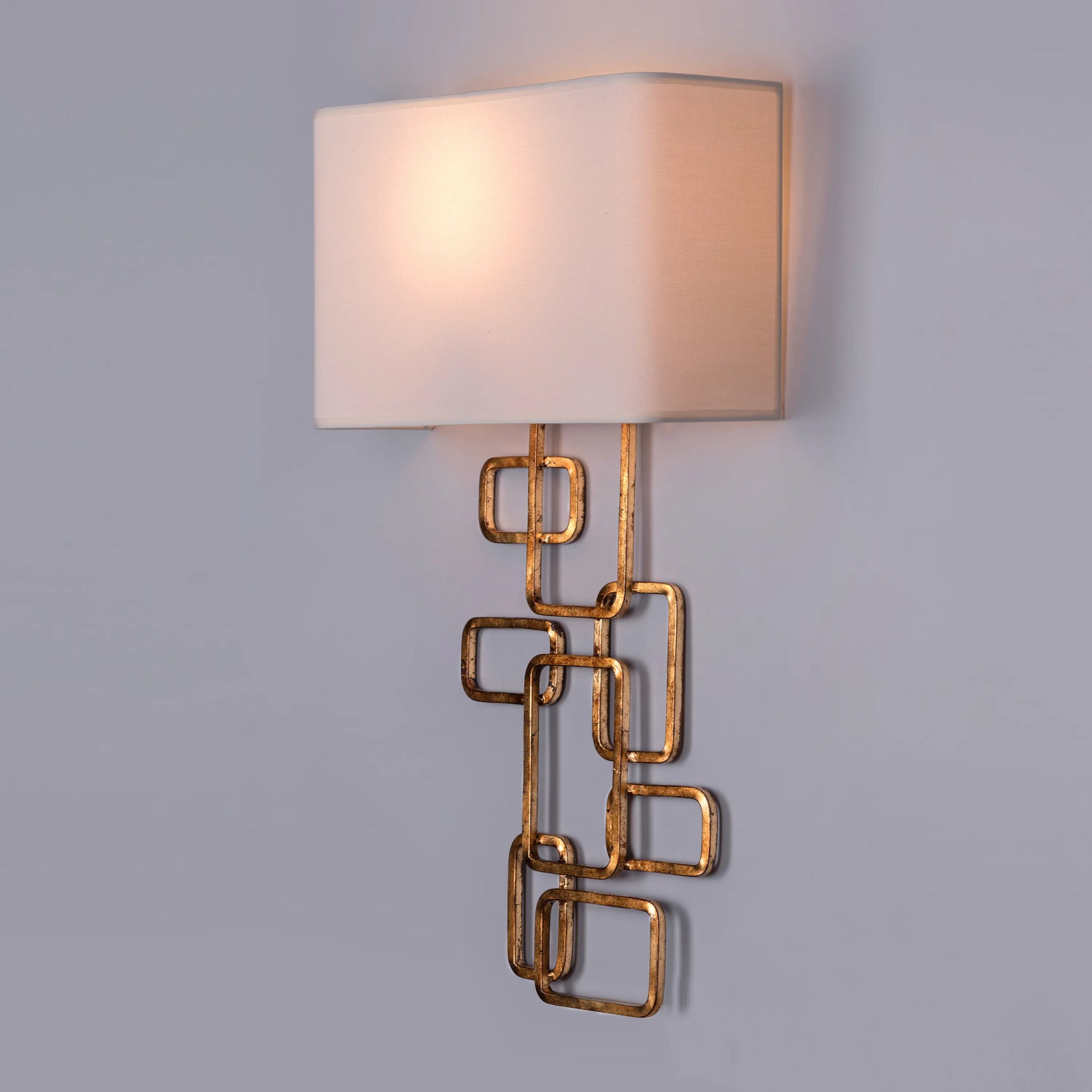 Elegant Sundowner Wall Light featuring circular sunset-inspired design with gradient illumination effect, mounted in premium metallic finish creating a floating halo of warm ambient light