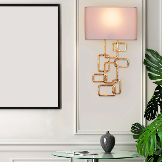 Elegant Sundowner Wall Light featuring circular sunset-inspired design with gradient illumination effect, mounted in premium metallic finish creating a floating halo of warm ambient light