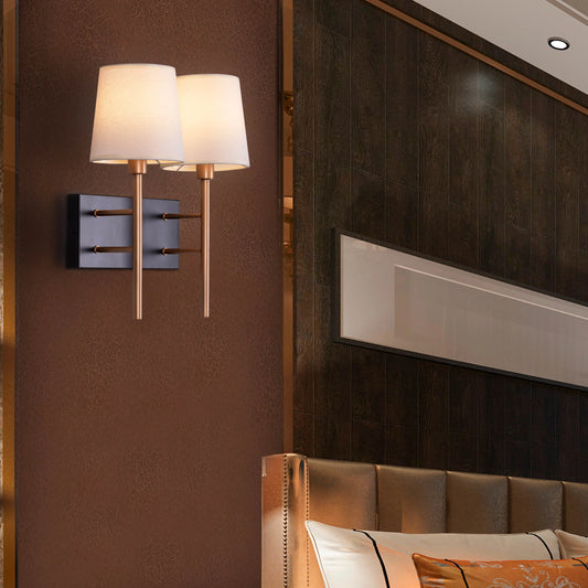 Sophisticated Dream Duo Wall Light featuring dramatic contrast of matte black and polished gold finishes, offering dual-source illumination with precise geometric design and premium metallic detailing