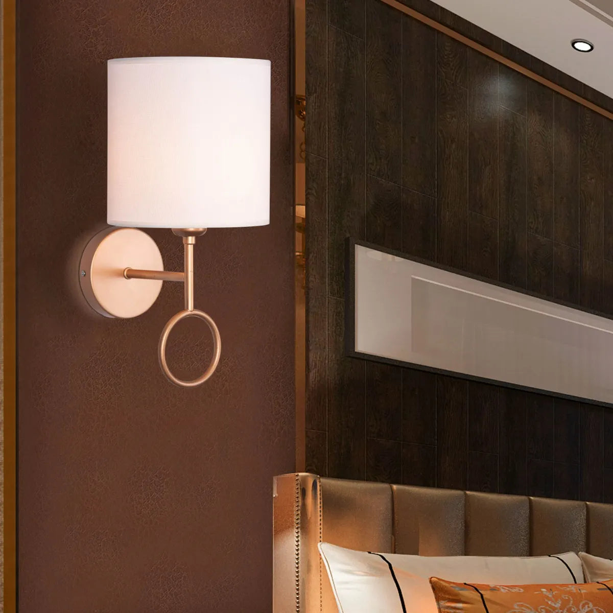 Elegant bedside wall light with soft, warm glow; minimalist design for luxury bedroom ambiance.
