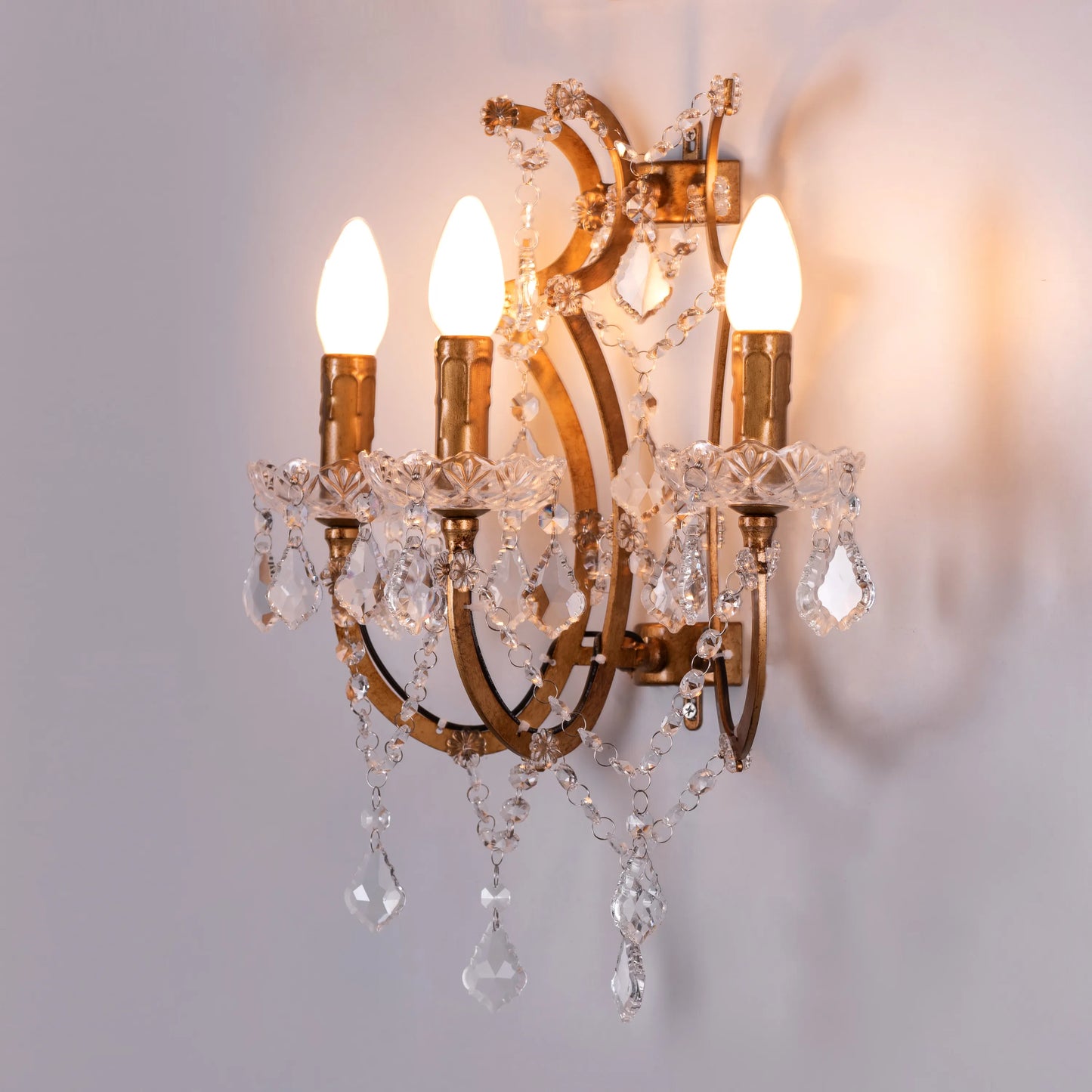 French Restoration Crystal Wall Light – luxurious wall light with intricate crystal accents and a classic design, casting a warm, ambient glow for a timeless and elegant atmosphere.
