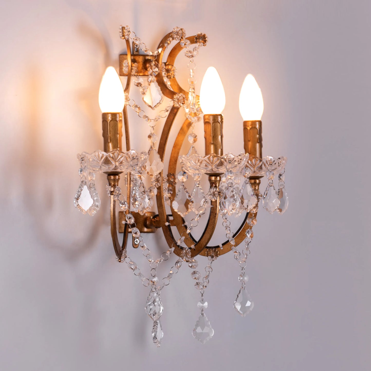 French Restoration Crystal Wall Light – luxurious wall light with intricate crystal accents and a classic design, casting a warm, ambient glow for a timeless and elegant atmosphere.