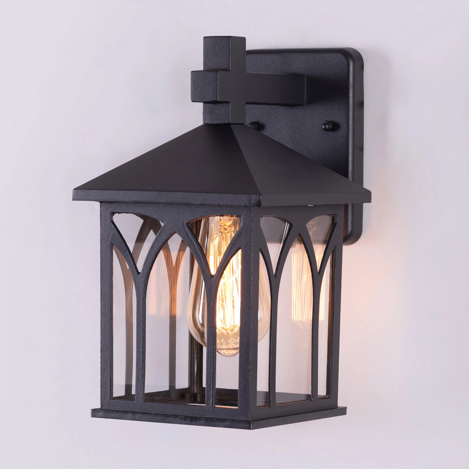 Dance More Outdoor/Indoor Wall Light – a versatile, modern wall light with sleek design and warm illumination, perfect for enhancing outdoor and indoor spaces with elegance and functionality.