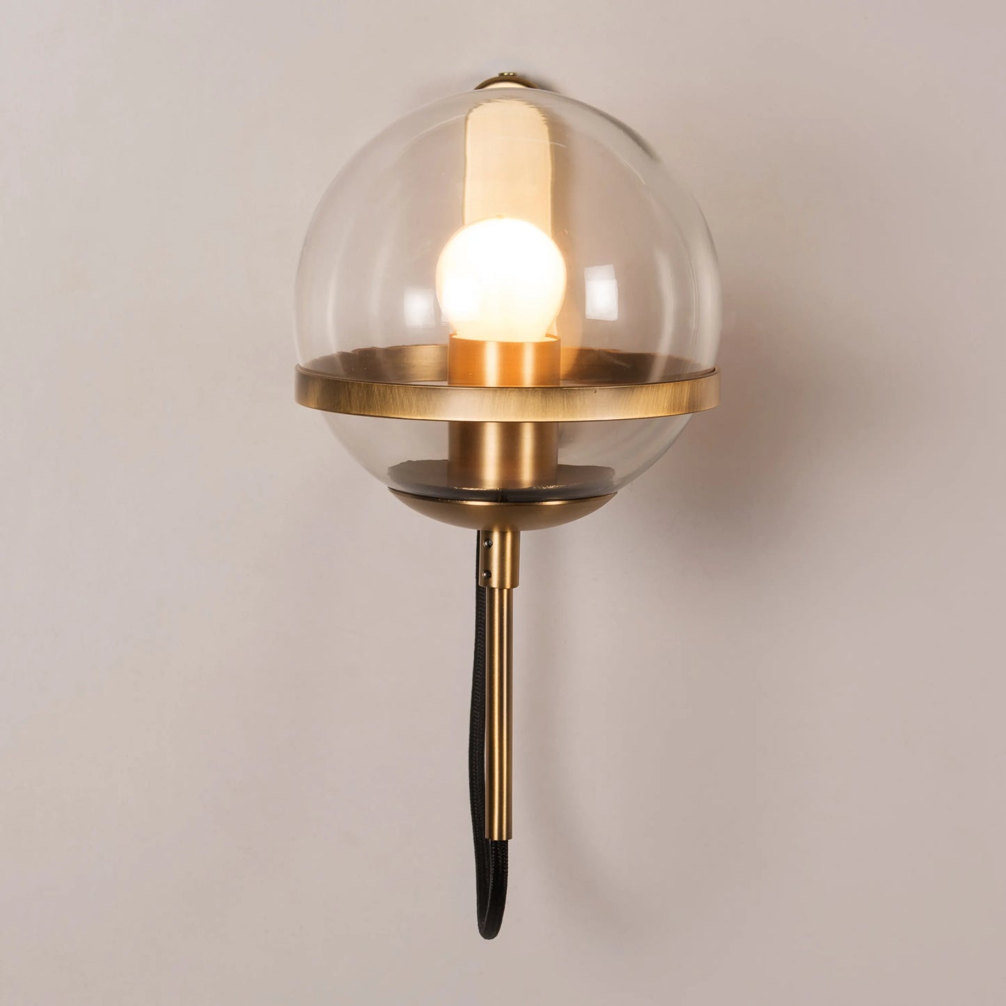 Mystique Clear Glass Wall Light – elegant clear glass wall light fixture offering a soft, ambient glow, perfect for modern interiors.