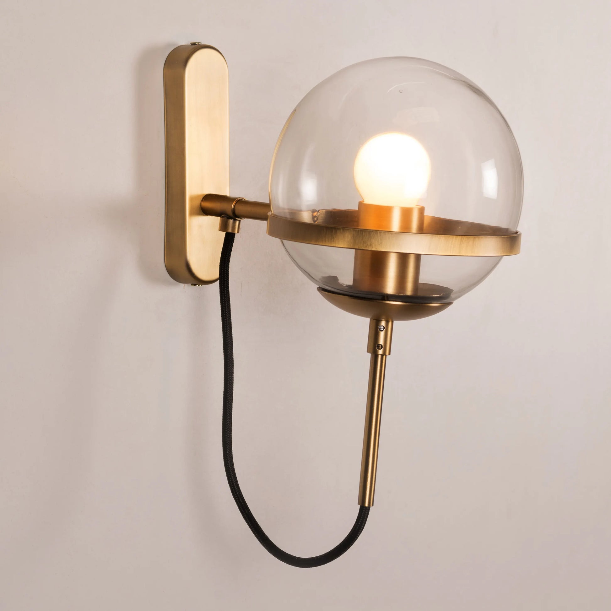 Mystique Clear Glass Wall Light – elegant clear glass wall light fixture offering a soft, ambient glow, perfect for modern interiors.