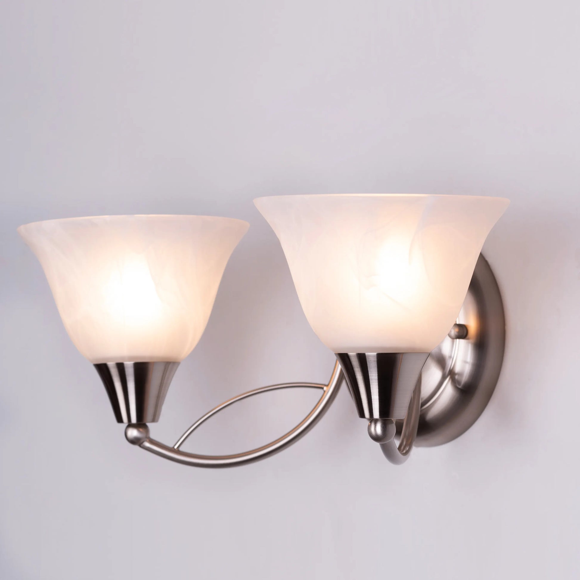 Come Home Wall Light mounted on neutral wall, featuring sleek modern design with premium finish and architectural presence, casting warm ambient illumination in contemporary interior setting