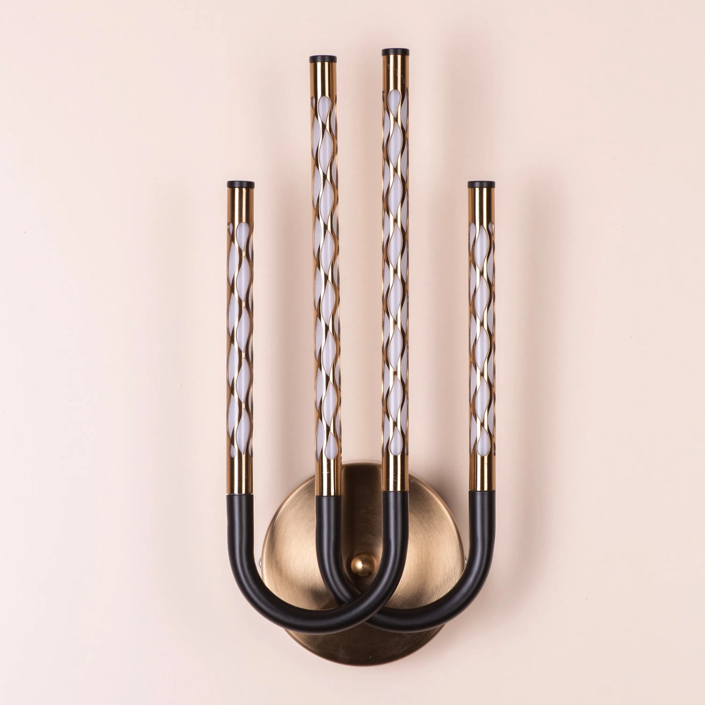 Tale To Tell Wall Light – elegant, artfully designed wall light that provides soft, ambient lighting, perfect for creating a cozy atmosphere in any room.